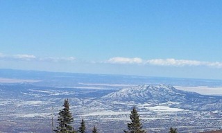  photo view from a high mountain of snowy landscape below