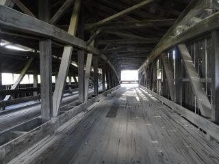 inside a two-lane covered bridge