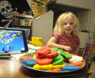 girl with her playdough food