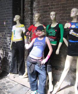 Holly, posing with mannequins, in Camden Market